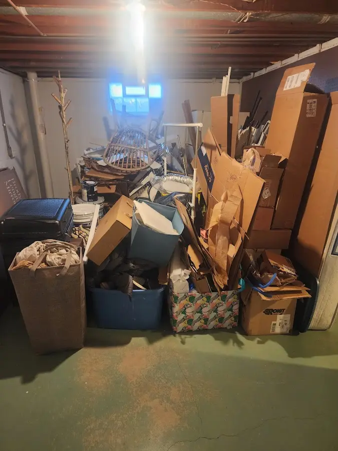 Roll-off dumpster container at job site for 8 Yard Dumpster Rental in East Haven